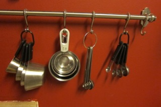 measuring cups bar on wall